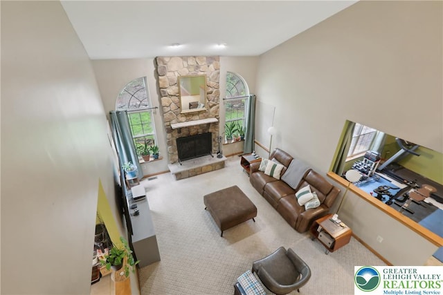 136 Outlook Ct, Middle Smithfield Twp, PA 18302 - living area featuring carpet floors and a stone fireplace