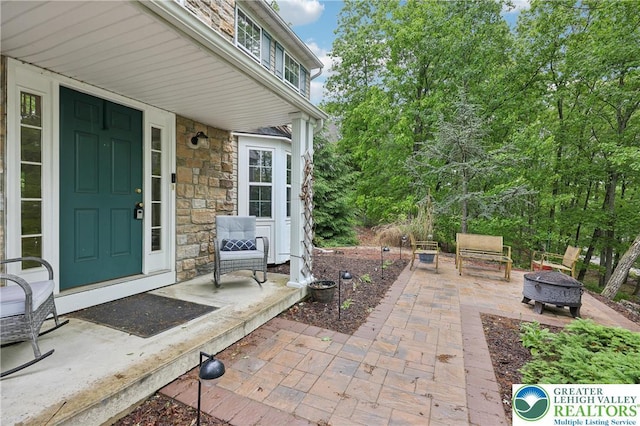 136 Outlook Ct, Middle Smithfield Twp, PA 18302 - view of patio / terrace featuring an outdoor fire pit