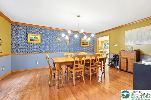 136 Outlook Ct, Middle Smithfield Twp, PA 18302 - dining room featuring wallpapered walls, ornamental molding, light wood-style floors, and baseboards