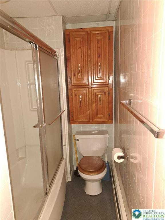 466 Franklin Ave, Palmerton Borough, PA 18071 - bathroom featuring tile walls, toilet, and a baseboard radiator