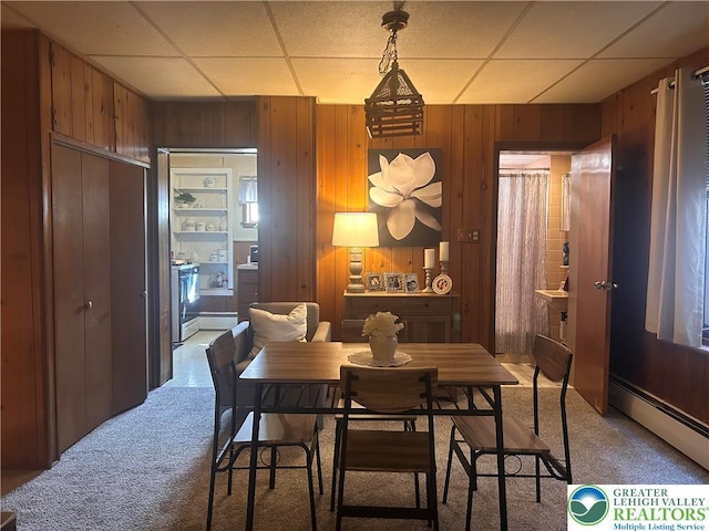 1210 Linden, Bethlehem City, PA 18018 - dining area with light colored carpet, a baseboard heating unit, wood walls, and a drop ceiling