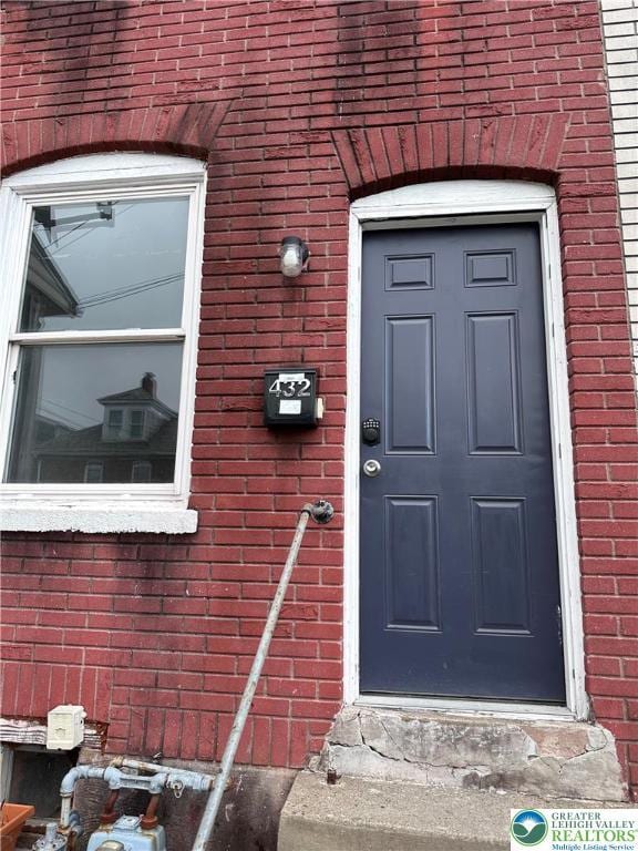 432 Schaffers Ct, Easton, PA 18042 - property entrance featuring brick siding
