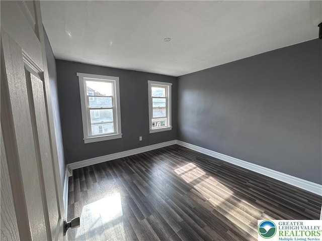 432 Schaffers Ct, Easton, PA 18042 - empty room featuring dark wood-type flooring and baseboards