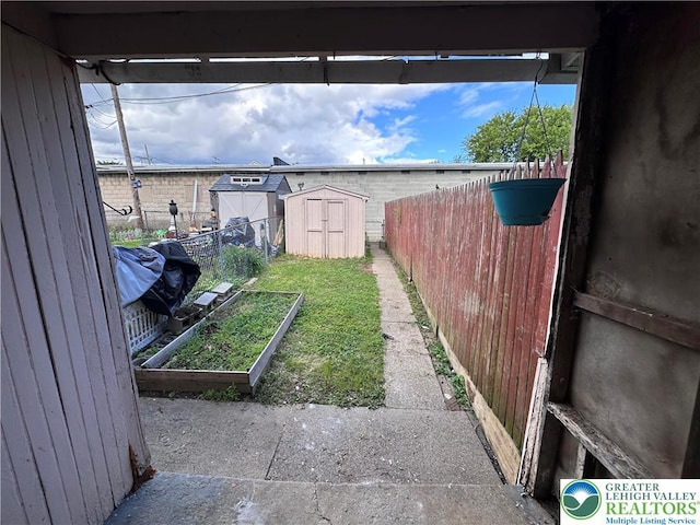 432 Schaffers Ct, Easton, PA 18042 - fenced backyard featuring a garden