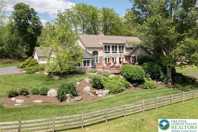 2965 Adams Way, Springfield Twp, PA 18077 - view of front of house with a deck and a chimney