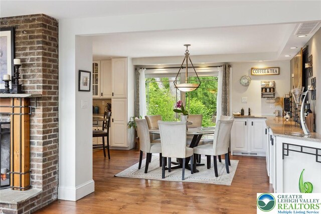 2965 Adams Way, Springfield Twp, PA 18077 - dining area with light wood-type flooring and baseboards