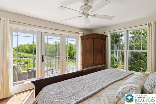 2965 Adams Way, Springfield Twp, PA 18077 - bedroom featuring access to exterior and ceiling fan