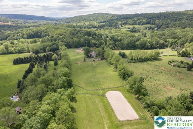 2965 Adams Way, Springfield Twp, PA 18077 - overview of rural landscape featuring a heavily wooded area