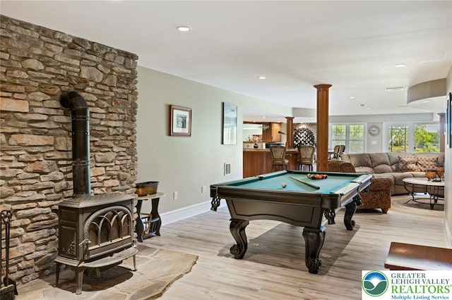 2965 Adams Way, Springfield Twp, PA 18077 - playroom with decorative columns, a wood stove, baseboards, billiards table, and light wood-style floors