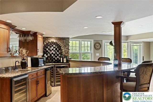 2965 Adams Way, Springfield Twp, PA 18077 - indoor wet bar featuring wine cooler, recessed lighting, and black microwave