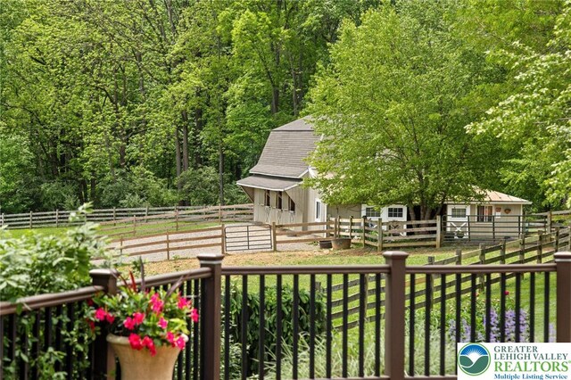2965 Adams Way, Springfield Twp, PA 18077 - view of yard with an exterior structure, an outbuilding, and a wooded view