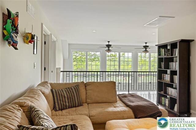 2965 Adams Way, Springfield Twp, PA 18077 - living area featuring a ceiling fan