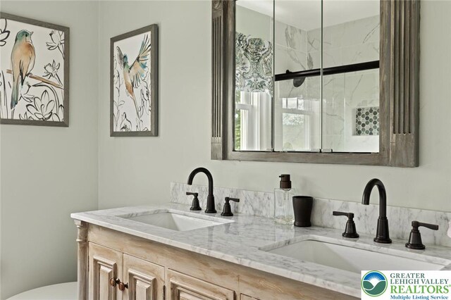 2965 Adams Way, Springfield Twp, PA 18077 - bathroom featuring double vanity, toilet, and a shower