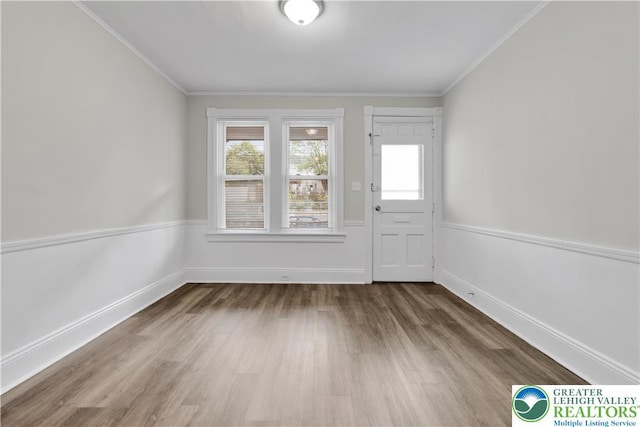 1123 Spruce St, Easton, PA 18042 - foyer entrance with wood finished floors and ornamental molding