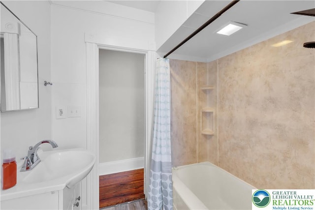 1123 Spruce St, Easton, PA 18042 - bathroom featuring shower / bath combo, baseboards, wood finished floors, and vanity