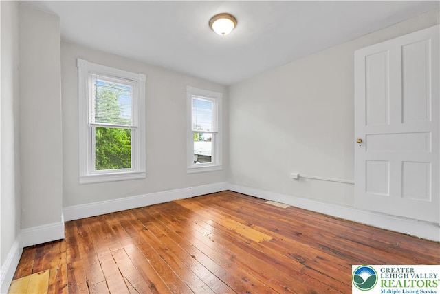1123 Spruce St, Easton, PA 18042 - empty room featuring baseboards and hardwood / wood-style floors