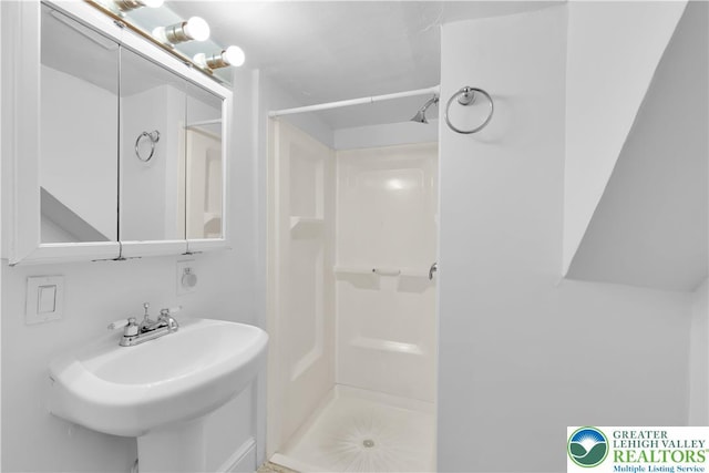 1123 Spruce St, Easton, PA 18042 - bathroom with a stall shower and a sink