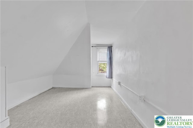 1123 Spruce St, Easton, PA 18042 - additional living space featuring vaulted ceiling and baseboards