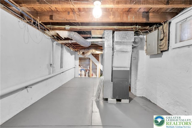 1123 Spruce St, Easton, PA 18042 - unfinished basement featuring electric panel and heating unit