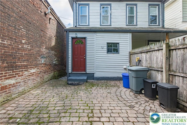 1123 Spruce St, Easton, PA 18042 - rear view of property with a patio