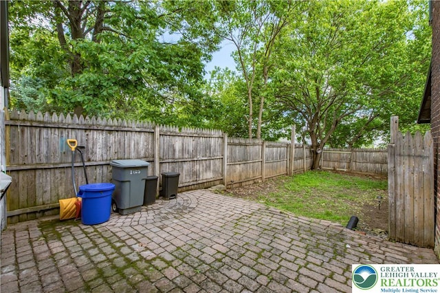 1123 Spruce St, Easton, PA 18042 - fenced backyard featuring a patio area
