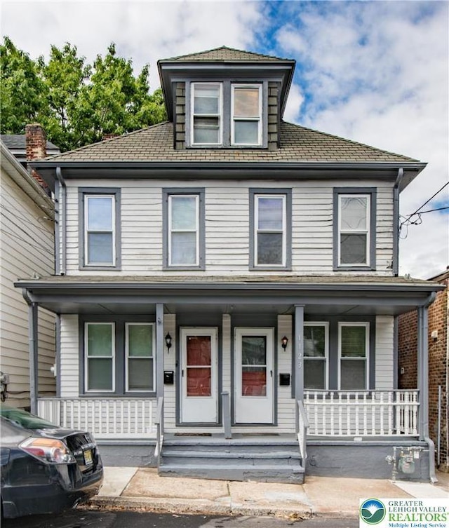 1125 Spruce St, Easton, PA 18042 - american foursquare style home featuring a porch