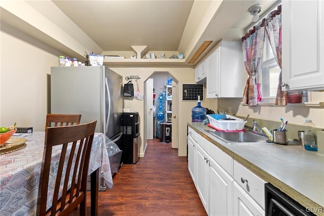521 S Bradford St, Allentown City, PA 18109 - kitchen with a sink, white cabinetry, dark wood-style flooring, and light countertops