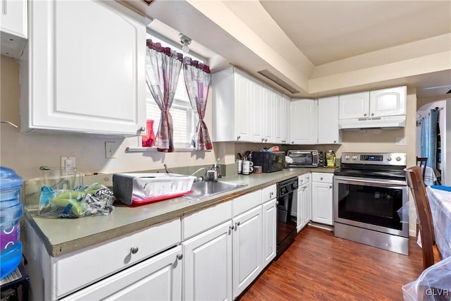 521 S Bradford St, Allentown City, PA 18109 - kitchen featuring stainless steel electric range oven, under cabinet range hood, dishwasher, dark wood-style flooring, and white cabinets