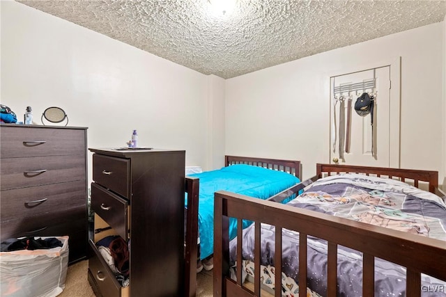 521 S Bradford St, Allentown City, PA 18109 - carpeted bedroom featuring a textured ceiling