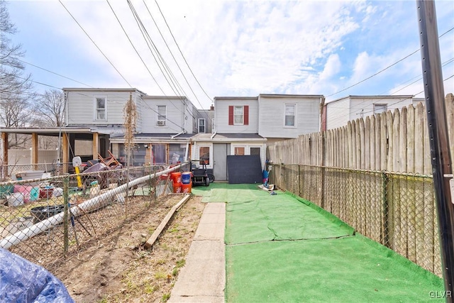 521 S Bradford St, Allentown City, PA 18109 - rear view of property featuring a fenced backyard