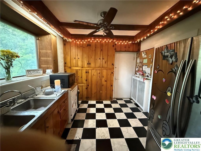 204 Analomink St, East Stroudsburg, PA 18301 - kitchen featuring black microwave, freestanding refrigerator, a sink, ceiling fan, and light flooring