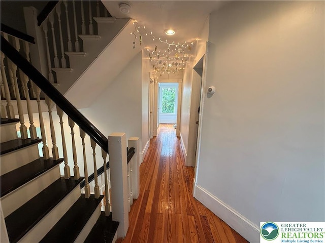 204 Analomink St, East Stroudsburg, PA 18301 - hall featuring baseboards, wood finished floors, and stairs