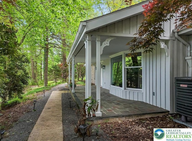 711 E Center St, Nesquehoning Borough, PA 18240 - view of side of home featuring board and batten siding and cooling unit