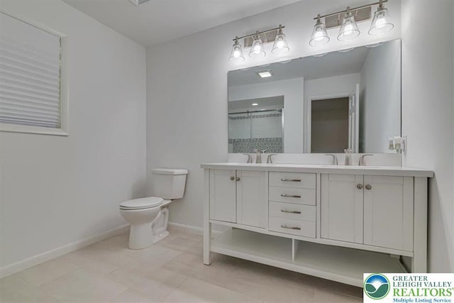 711 E Center St, Nesquehoning Borough, PA 18240 - full bathroom with toilet, double vanity, baseboards, a shower, and tile patterned floors