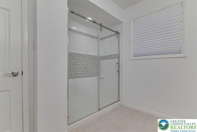 711 E Center St, Nesquehoning Borough, PA 18240 - bathroom featuring a stall shower and baseboards
