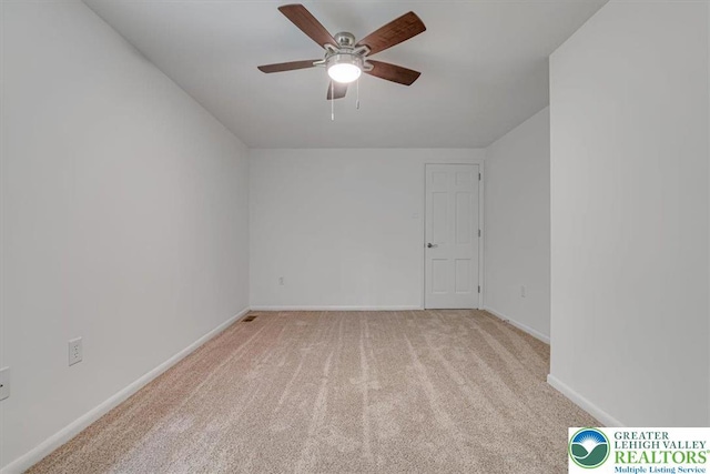 711 E Center St, Nesquehoning Borough, PA 18240 - carpeted spare room featuring a ceiling fan and baseboards