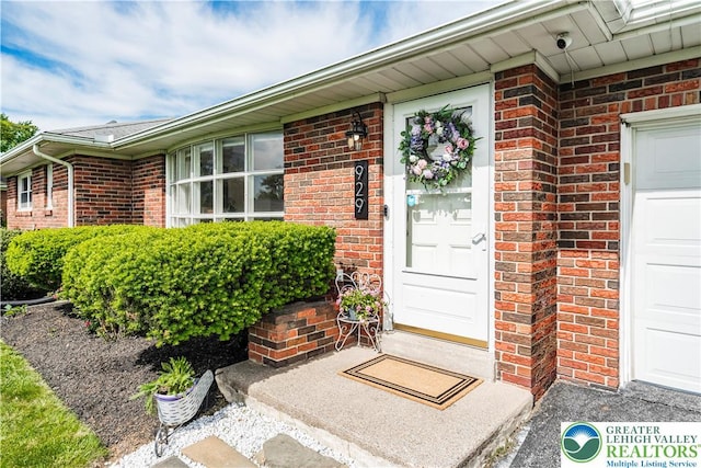 929 Webster Ave, Allentown City, PA 18103 - property entrance with brick siding, a surveillance system, and a garage