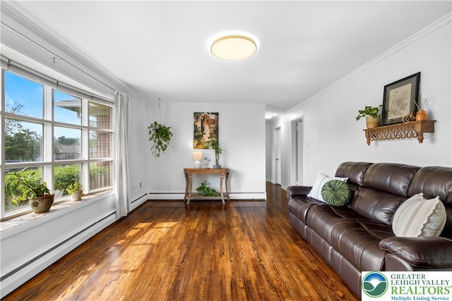 929 Webster Ave, Allentown City, PA 18103 - living area with a baseboard heating unit, wood finished floors, crown molding, and a baseboard radiator