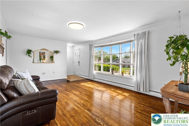 929 Webster Ave, Allentown City, PA 18103 - living area with ornamental molding, wood finished floors, a baseboard radiator, and baseboards