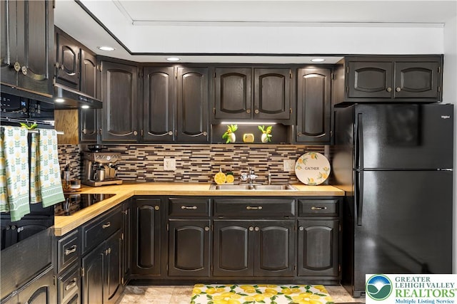 929 Webster Ave, Allentown City, PA 18103 - kitchen with black appliances, a sink, decorative backsplash, and butcher block counters