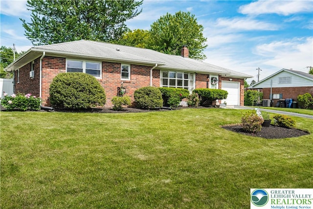 929 Webster Ave, Allentown City, PA 18103 - ranch-style house featuring an attached garage, a chimney, brick siding, and a front lawn