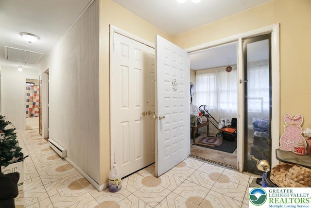 4754 Brentwood Dr, Tobyhanna Twp, PA 18466 - corridor with attic access, light tile patterned floors, and baseboard heating