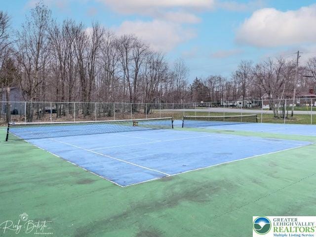 4754 Brentwood Dr, Tobyhanna Twp, PA 18466 - view of tennis court featuring view of scattered trees