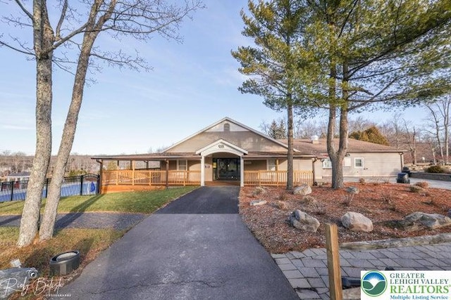 4754 Brentwood Dr, Tobyhanna Twp, PA 18466 - view of front of home featuring a porch and asphalt driveway