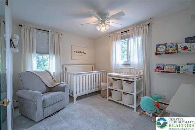 1131 28th St, Allentown City, PA 18104 - bedroom featuring carpet flooring, a baseboard radiator, and ceiling fan
