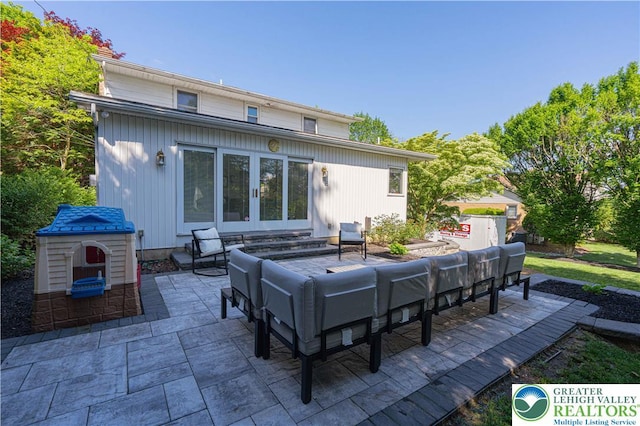 1131 28th St, Allentown City, PA 18104 - rear view of house featuring outdoor lounge area and a patio