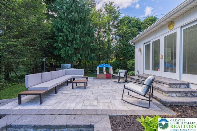 1131 28th St, Allentown City, PA 18104 - view of patio with french doors, outdoor lounge area, and grilling area