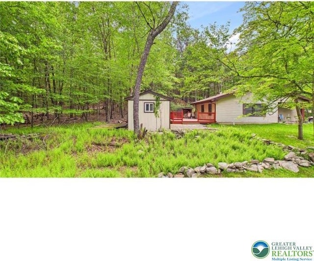 108 Abbey Ln, Lehman Twp, PA 18302 - view of yard featuring a deck