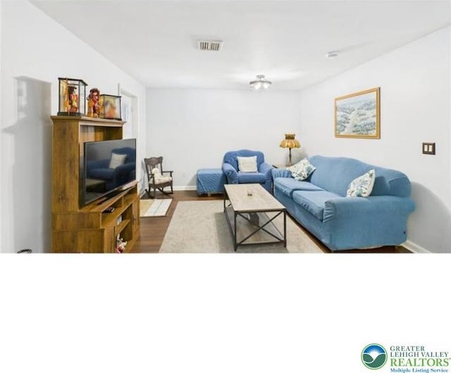 108 Abbey Ln, Lehman Twp, PA 18302 - living area with wood finished floors and baseboards