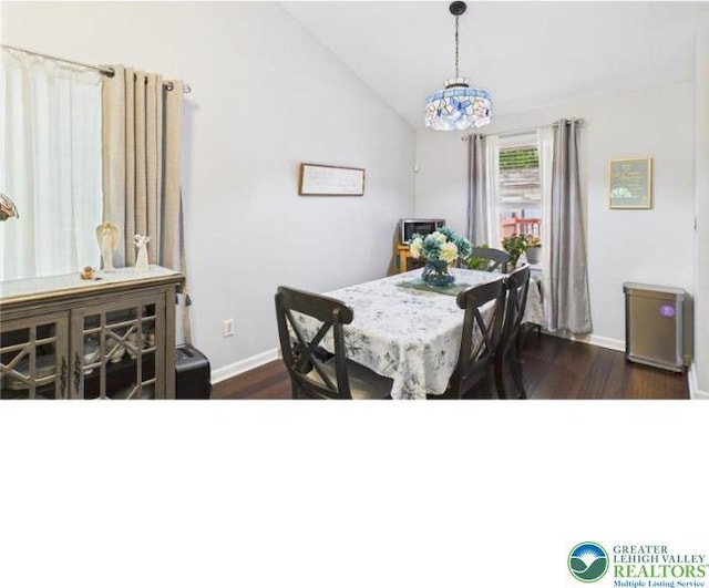108 Abbey Ln, Lehman Twp, PA 18302 - dining area featuring dark wood-style floors, lofted ceiling, baseboards, and a chandelier